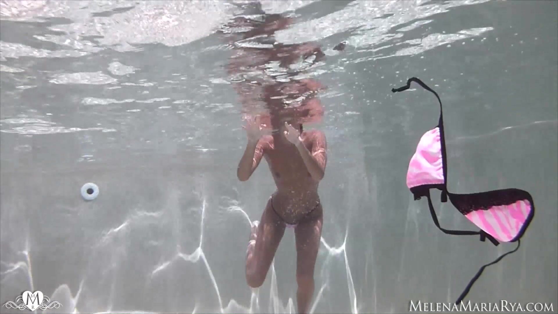 Underwater erotic fingering