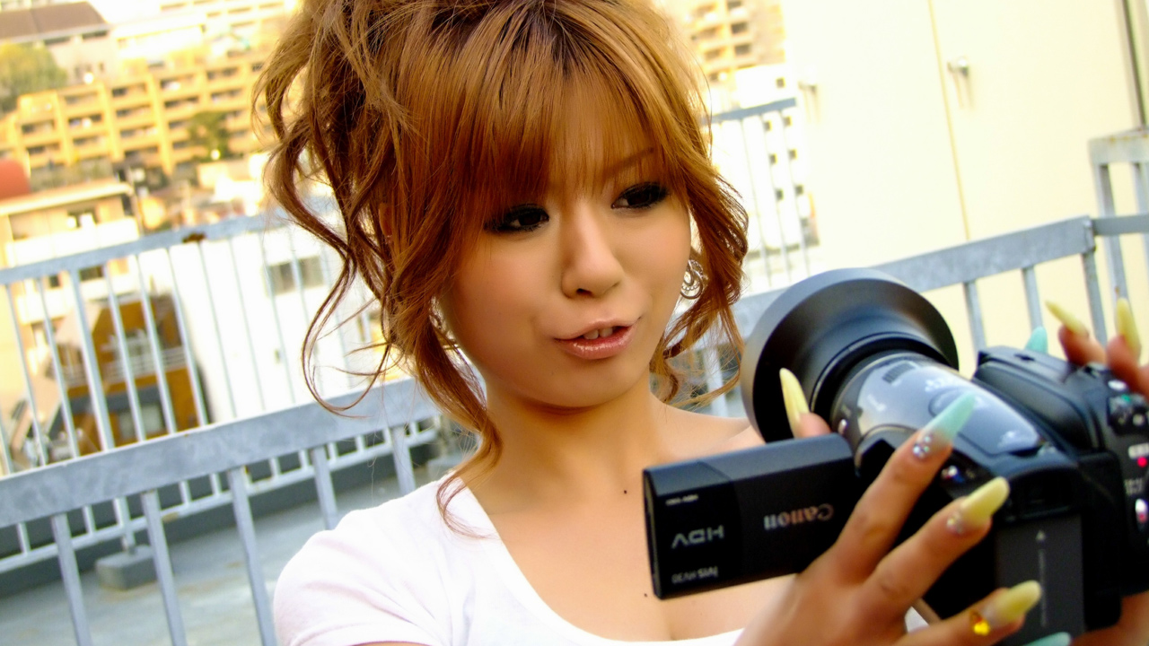 Cute Japanese girl wears a vibrator in her shorts
