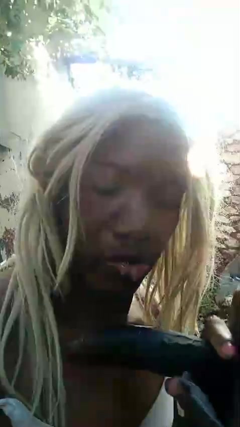 Sucking on blacks 10inches chocolate Dick in the forest