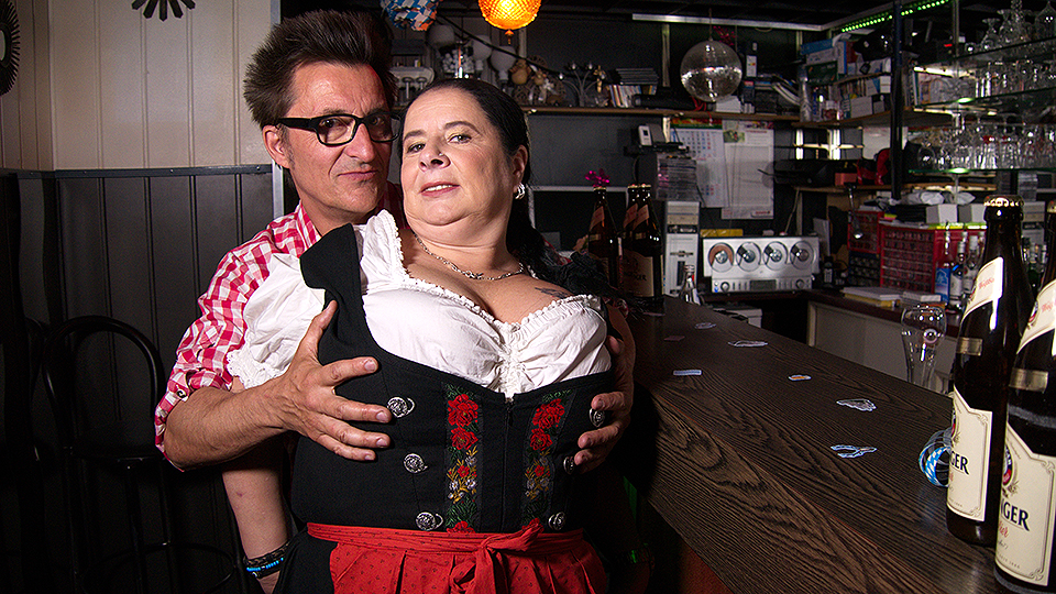 Big breasted German waitress having fun with the beerfesten