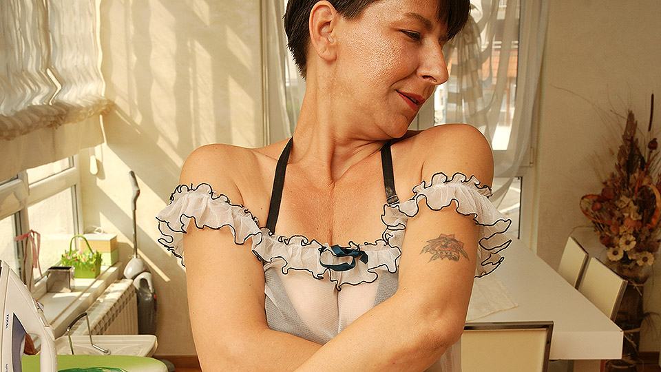 Naughty housewife getting hot during her work