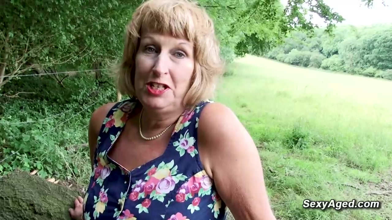 British blonde granny Rosemary plays with her pussy outdoor