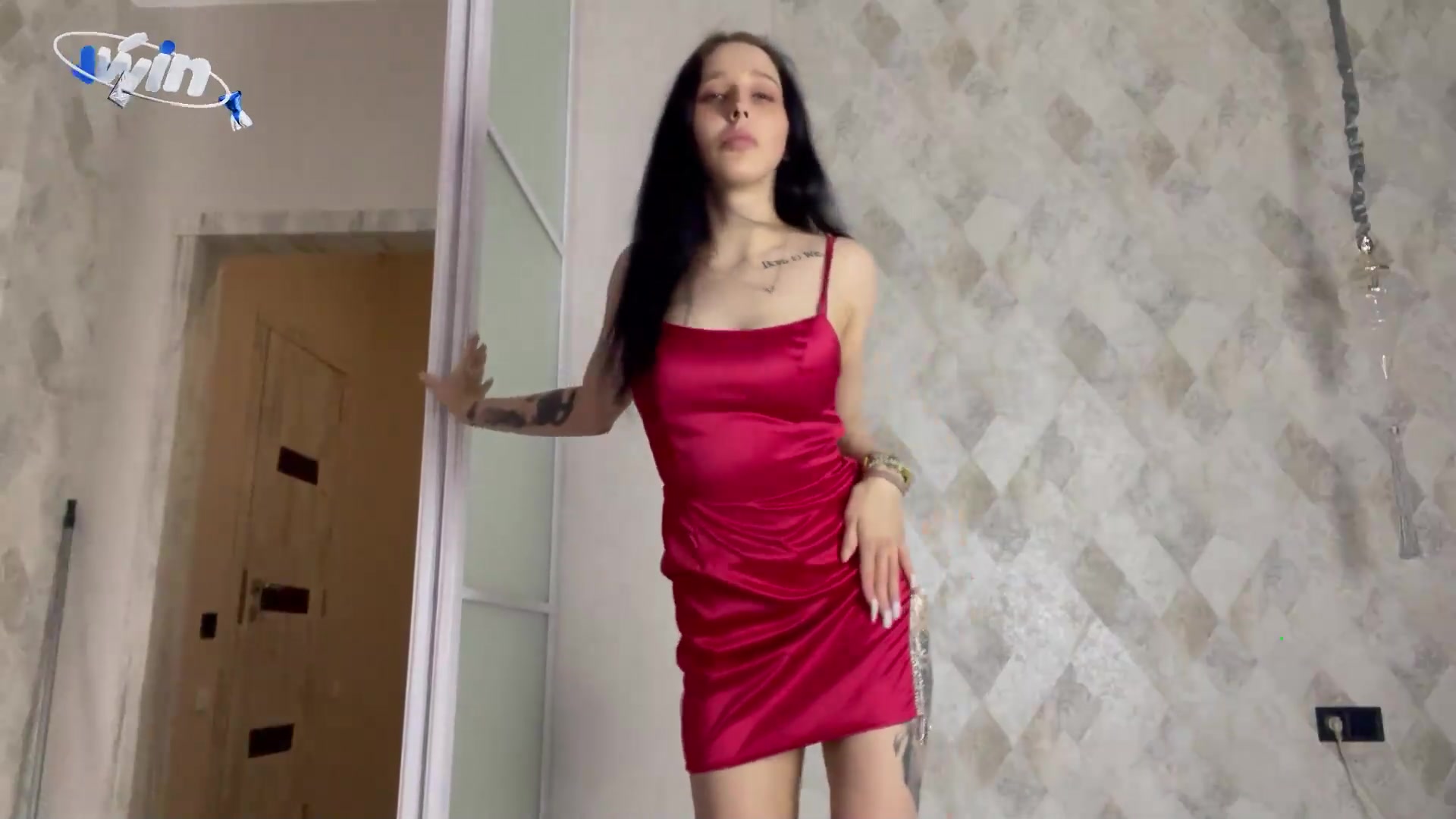 A depraved teen dances a striptease in a crimson sundress and frigs her taut pus
