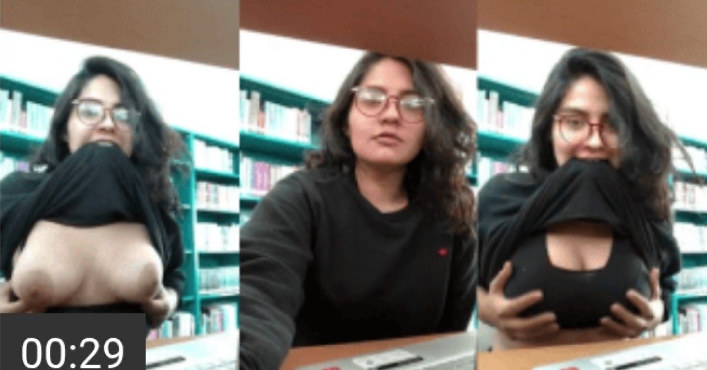 Vintage viral busty Desi girl in library pulls shirt up to