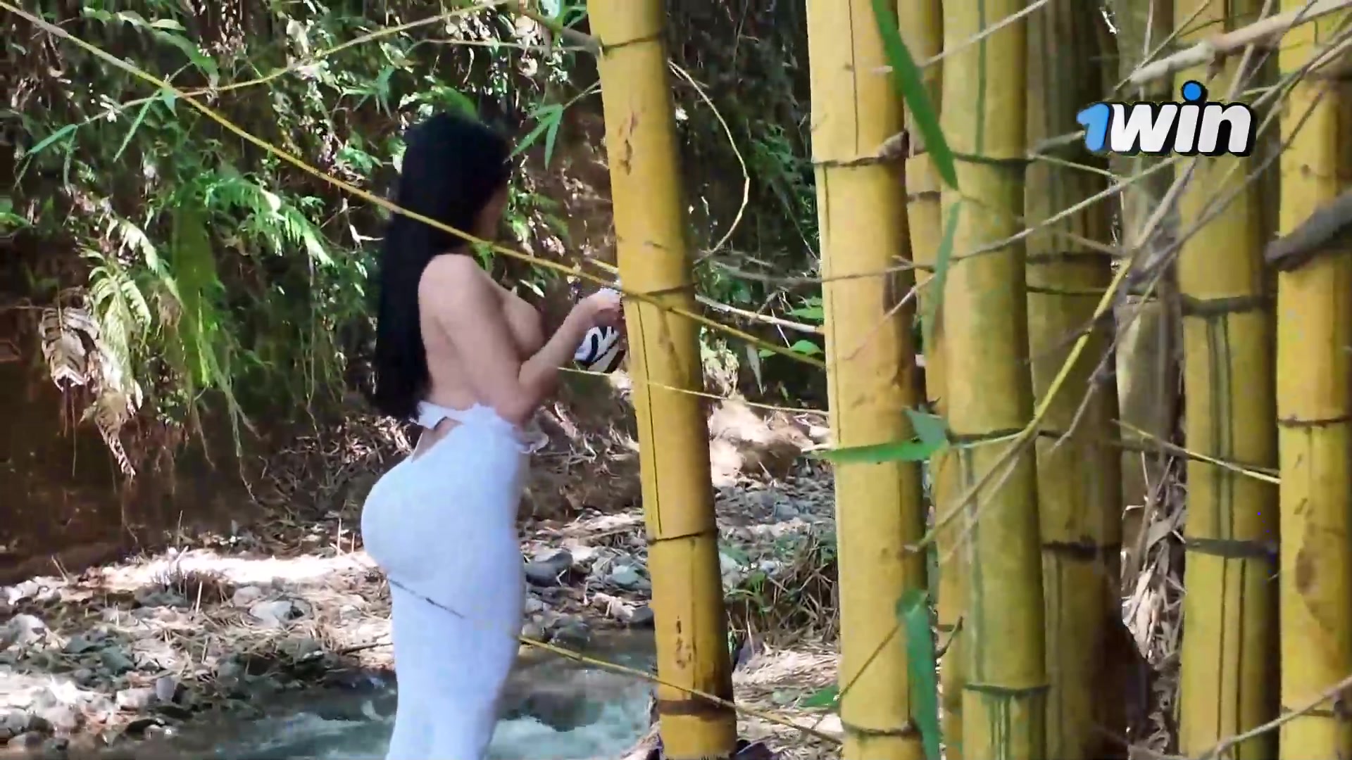 Sultry May Hernandez pumps out in a river while savagely fingering her scorching