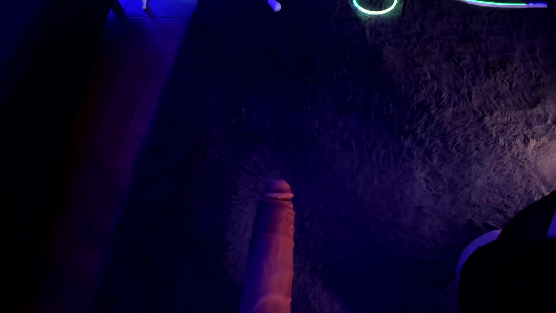 Goth Brunette Gives Sloppy Blowjob Under Purple Lights