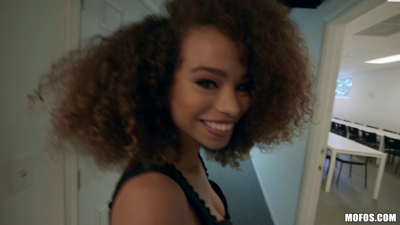 Curly haired black beauty slobbers a big cock